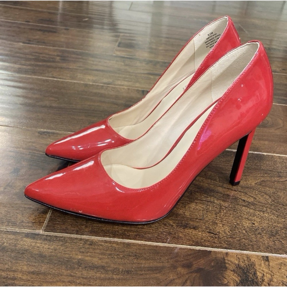 Nine West red pumps
